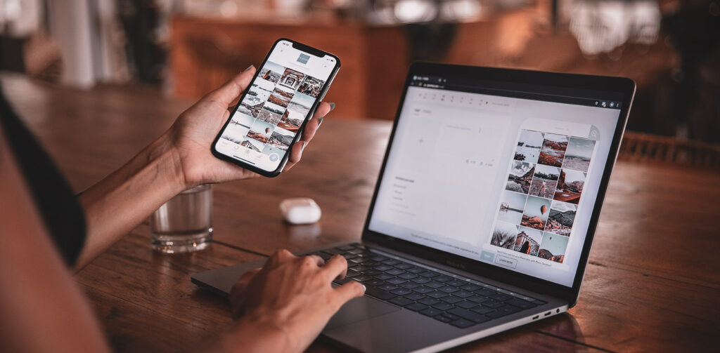 Woman using laptop with one hand and mobile phone with the other, screens showing optimized views of the same web app.